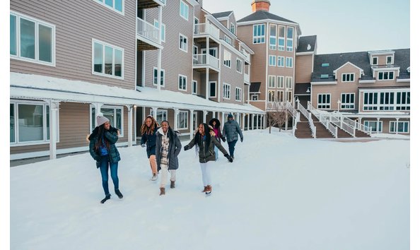 Big image mount ascutney resort people walking through snow 1440x1080