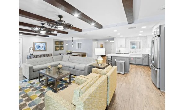 Big image cape canaveral resort four bedroom signature collection living kitchen 1440x1080