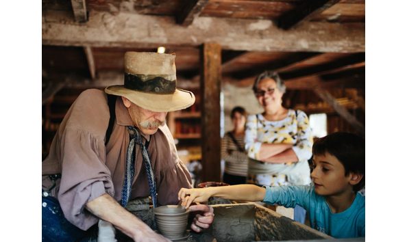 Big image kid interacting with potter 1280x960