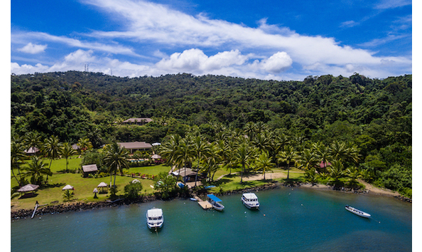 Big image copy of resort drone shot   looking at resort from sea