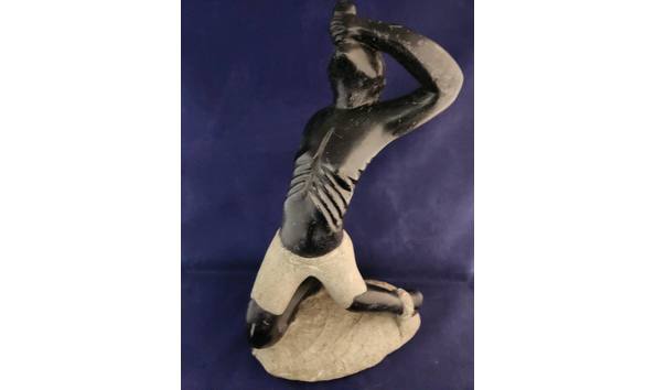 Big image shackled stone man 2