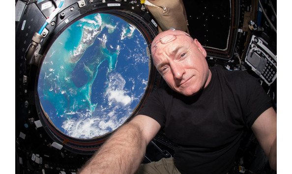 Big image iss 44 scott kelly seen inside the cupola