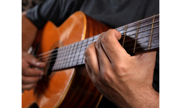 Big image playing acoustic guitar lg