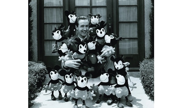 Big image walt surrounded by mickey dolls