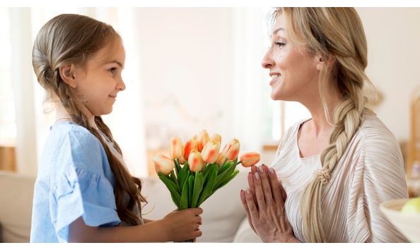 Big image daughter giving mother bouquet tulips as gift