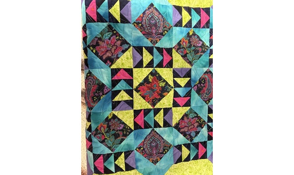 Big image bright fabric with navy accents wall quilt 2