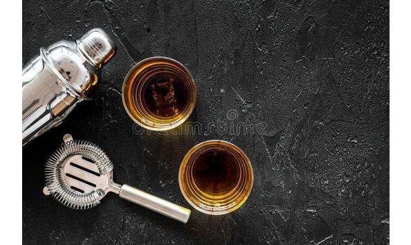 Big image alcohol cocktails whiskey ice bartender tools black bar background top view mockup alcohol cocktails whiskey ice 101887466