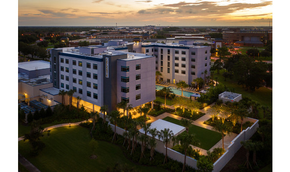 Big image celeste hotel exterior aerial rear to school 1