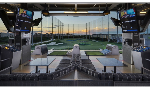 Big image top golf hitting bay with lounge seating